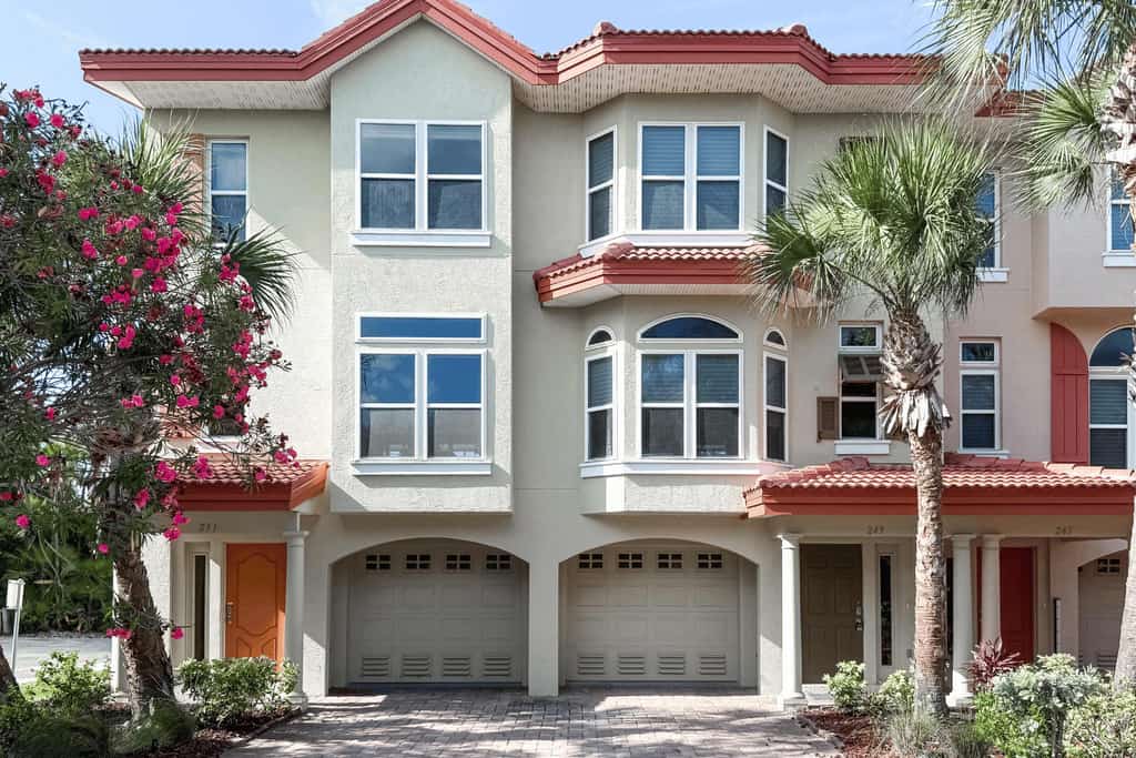 Family-friendly, 3-bedroom, oceanside townhouse with private elevator and screened-in balcony, washer/dryer, and central A/C