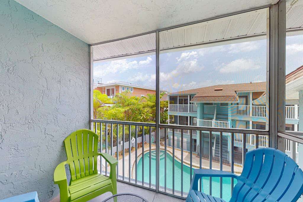 Breezy condo with WiFi & pool - minutes from beach, shopping, & dining