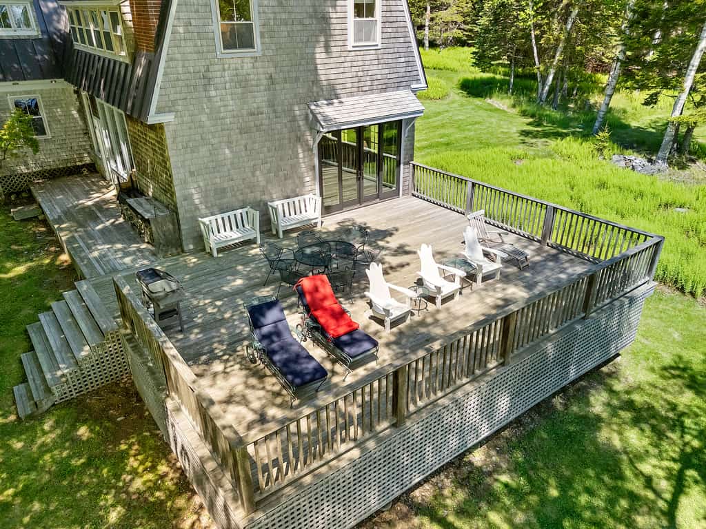 Oceanfront 5BR island retreat with deck, fireplace, and kayaks