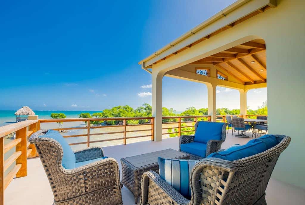 Tropical retreat with a pool, dock, bikes, canoes, balconies, and 360 views