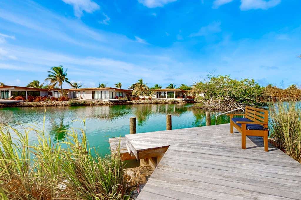Relaxing lagoonfront villa with private pool, dock, café & on-site spa