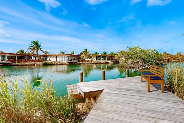 Relaxing lagoonfront villa with private pool, dock, café & on-site spa