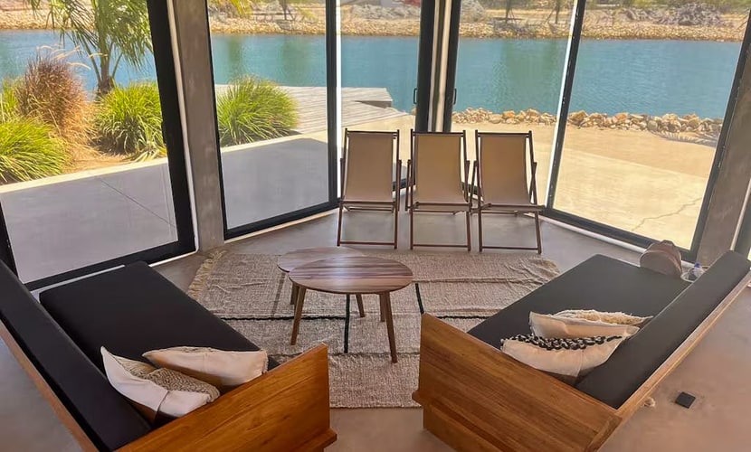 Relaxing tropical villa with private plunge pool, open layout & canal water view