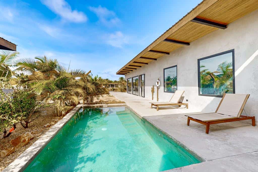 Water-view villa with plunge pool, private deck, full kitchen & partial AC