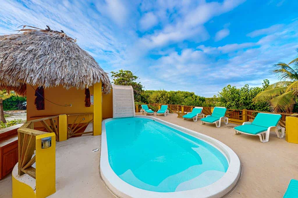 Waterfront villa with private pool, balcony, partial AC, fast WiFi - near beach