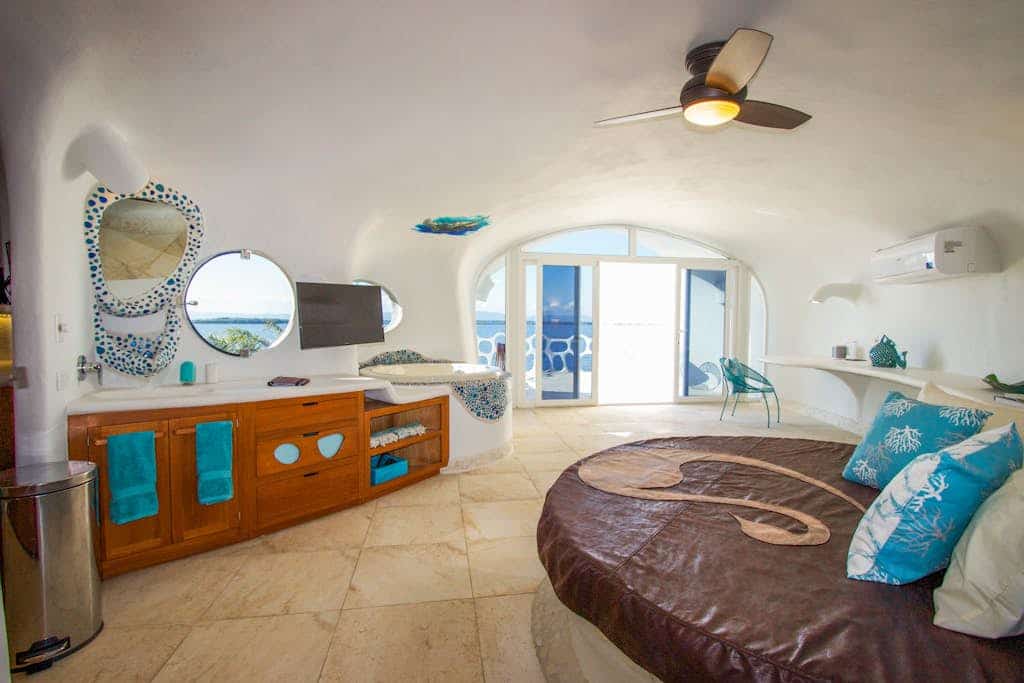 Lagoon-front studio with water access, infinity pool, & AC