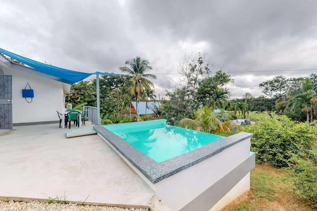 Welcoming home near town with private pool, jungle views, WiFi & partial AC