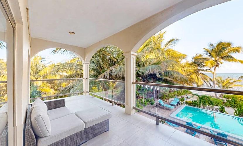 Relaxing condo with shared pool, ocean views, partial AC & WiFi
