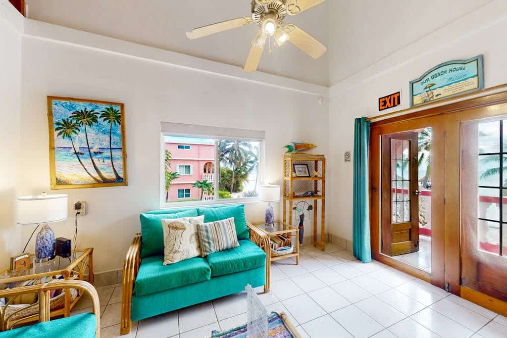 Breezy oceanfront, 2-story condo w/shared pool, beach access, WiFi & partial AC