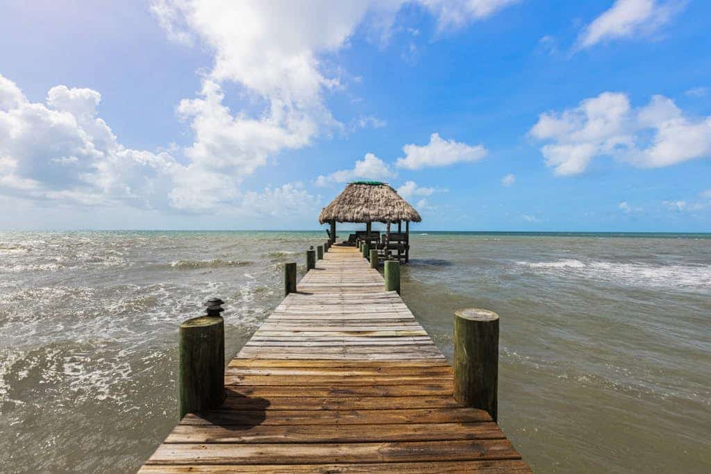Tropical beachfront getaway with private pool, ocean views & enclosed yard