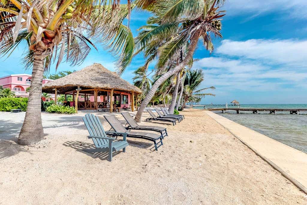 Stay at Caribe Island Resort, a beachfront complex on Ambergris Caye near San Pedro, in a comfortable second-floor studio designed for two. Enjoy the shared outdoor pool and beach access, with a private studio, queen bed, kitchenette, and balcony or patio to return to after a day on the island.