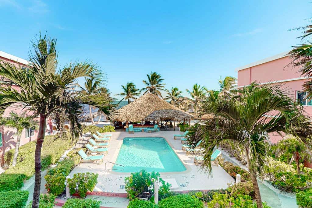 Oceanfront condo w/ shared pool, sea view, WiFi & partial AC - steps to beach