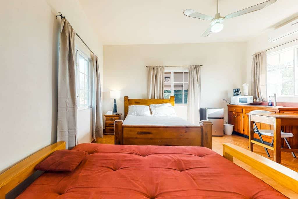 Charming studio w/ ocean view, deck, partial AC & WiFi - short walk to the beach