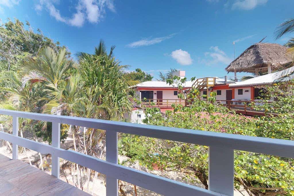 Oceanfront condo with shared pool, sea view, central AC & WiFi - walk to the beach