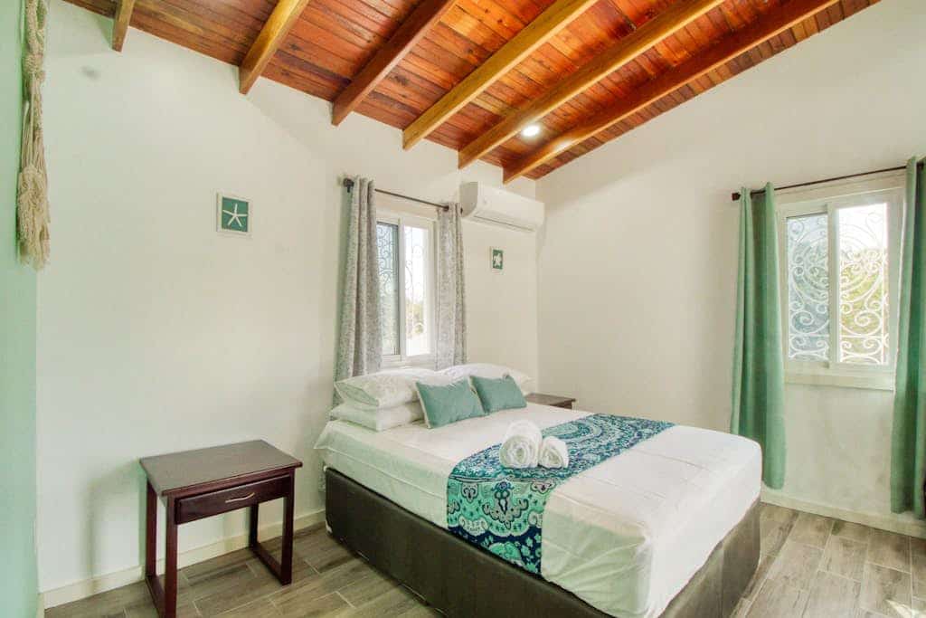 Island studio centrally located with balcony, hammock, & grill