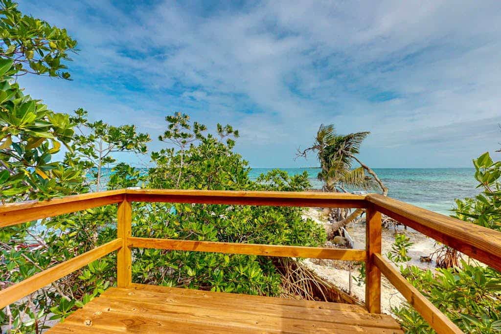 Rustic beachfront cabin with private deck, ocean views & family-friendly vibe