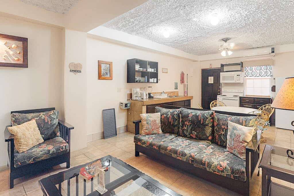 Homey suite in town w/ WiFi, partial AC, shared pool & veranda - walk to beach
