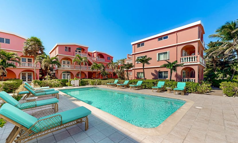 Ocean view condo w/ shared pool, free WiFi & partial AC - steps from the ocean