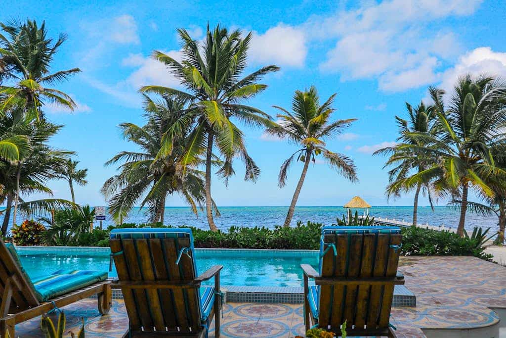 Serene oceanfront condo with shared pool, ocean view, WiFi, & partial AC