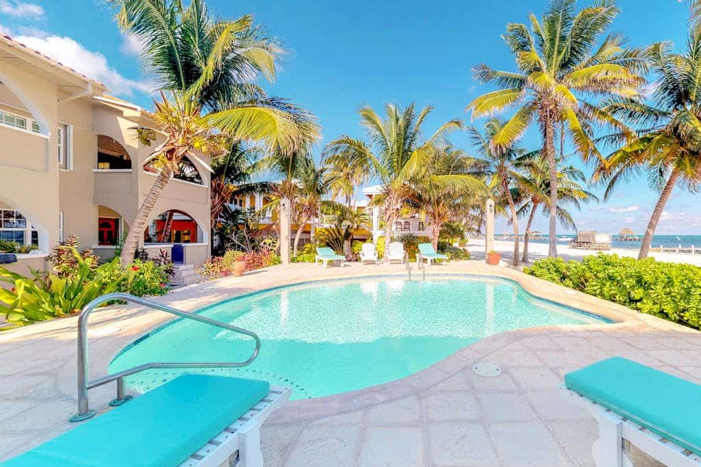 Family-friendly beachfront condo w/shared pool/dock, sea view, WiFi & partial AC