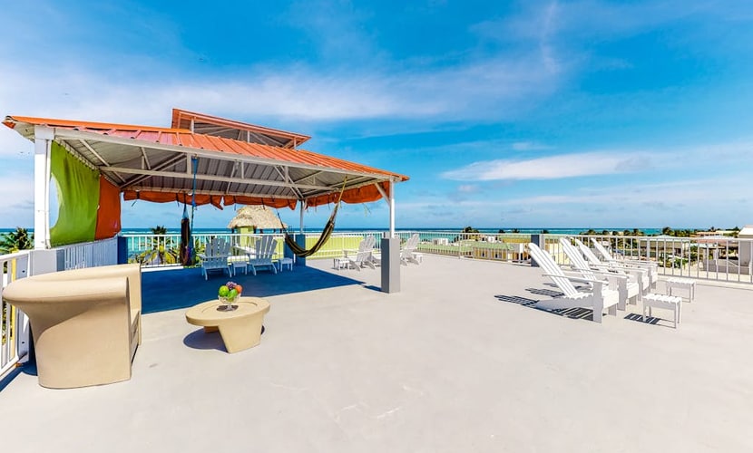 Inviting apartment w/ ocean views, a shared rooftop, laundry, WiFi & partial AC