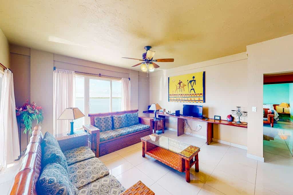 Waterfront resort villa with water views, balcony, full kitchen, & washer/dryer