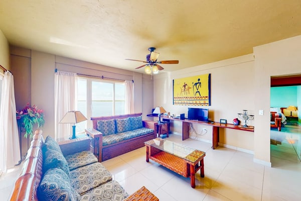Waterfront resort villa with water views, balcony, full kitchen, & washer/dryer