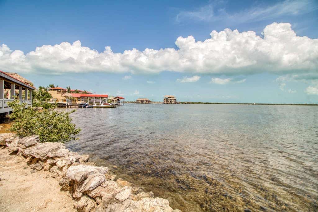 Waterfront resort villa with water views, balcony, full kitchen, & washer/dryer