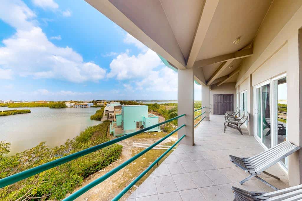 Settle into island life at this renovated two-bedroom, two-bath condo at Mara Laguna, a well-known waterfront condominium community in the peaceful Tres Cocos area of Ambergris Caye.