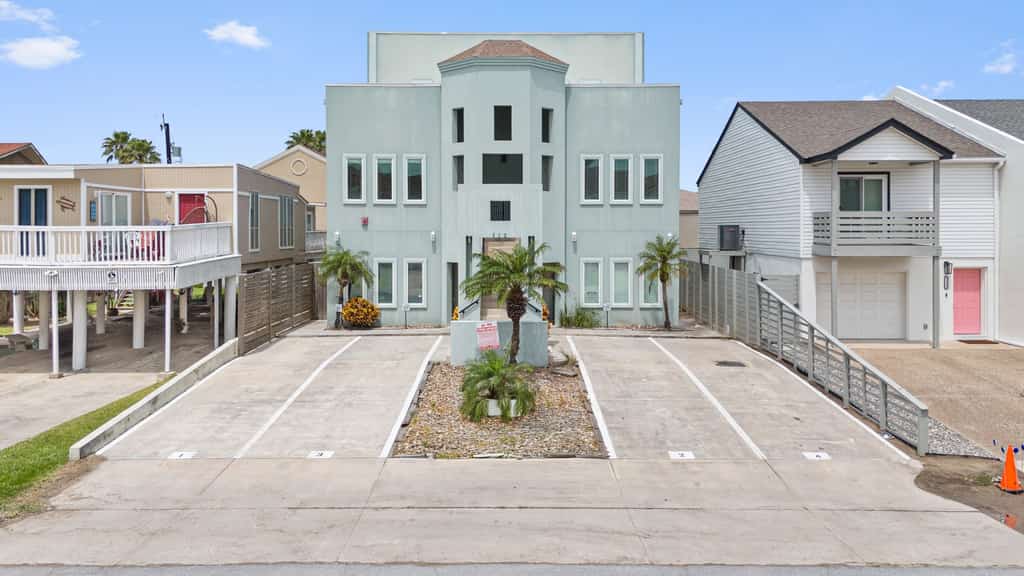 Welcome to Island Dream, a bright three-story retreat on the Gulf side of South Padre Island, just a short walk to the beach. Three bedrooms and three full baths give everyone room to spread out, the open living and kitchen invite easy meals, and the shared pool out back is perfect on warm Texas days. Soak in the primary suite garden tub, catch the breeze on the deck, and let the island set the pace. Sun, sand, and slow mornings start right here.