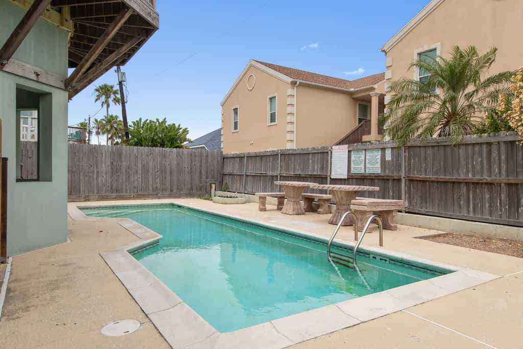 Welcome to Island Dream, a bright three-story retreat on the Gulf side of South Padre Island, just a short walk to the beach. Three bedrooms and three full baths give everyone room to spread out, the open living and kitchen invite easy meals, and the shared pool out back is perfect on warm Texas days. Soak in the primary suite garden tub, catch the breeze on the deck, and let the island set the pace. Sun, sand, and slow mornings start right here.