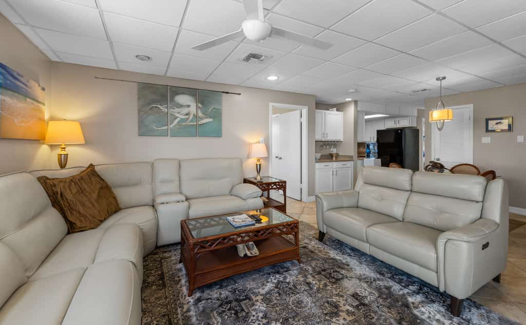 Welcome to Galleon's Getaway, a breezy bayfront condo on South Padre Island. Watch calm Laguna Madre water from your wraparound balcony, sip morning coffee in the salt air, and fire up the grill as the sun drops over the bay. Inside, an open living space, full kitchen, and two bedrooms sleep four. The shared pool and hot tub sit steps away, and the Gulf beaches are a short trip across the island. Made for longer stays, it is an easy place to settle in for a month or a season on the water.