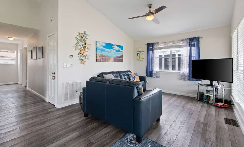 Welcome to Star Fish Wish, a bright single-level cottage in the gated Long Island Village resort in Port Isabel. Sip your morning coffee on the covered deck overlooking the golf course, gather in the open living and kitchen, and unwind in two restful bedrooms. Your stay includes access to the resort pools, hot tub, fitness center, tennis, and marina. Pet friendly and made for easy Gulf Coast living, just minutes from South Padre beaches. Book your coastal escape today.