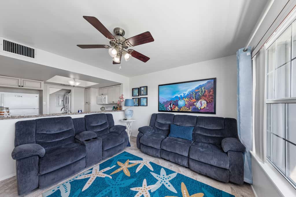 Welcome to Lazy Days Sea Cottage, a two-story canal-front retreat in Port Isabel's gated Long Island Village. Take in the water from the upstairs deck, watch the boats drift along the canal, and gather in a bright, beachy living space with a full kitchen. A king primary suite tops the home, and a family bunk room sleeps the kids, with room for six in all. Resort pools, golf, and tennis are steps away, and South Padre Island beaches are a ten-minute drive over the causeway.