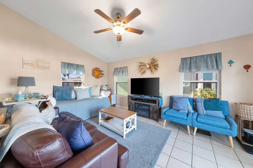 Welcome to Mermaid Manor, a charming waterfront cottage on a quiet canal in the gated Long Island Village resort near Port Isabel. Relax on the covered deck over the water, gather in a bright open living space, and spread out with sleeping for six in a cozy one-bedroom layout. Dive into the resort pools, play the par-3 golf course, or cross the causeway to South Padre Island beaches in minutes. Your easygoing Gulf Coast getaway starts here.