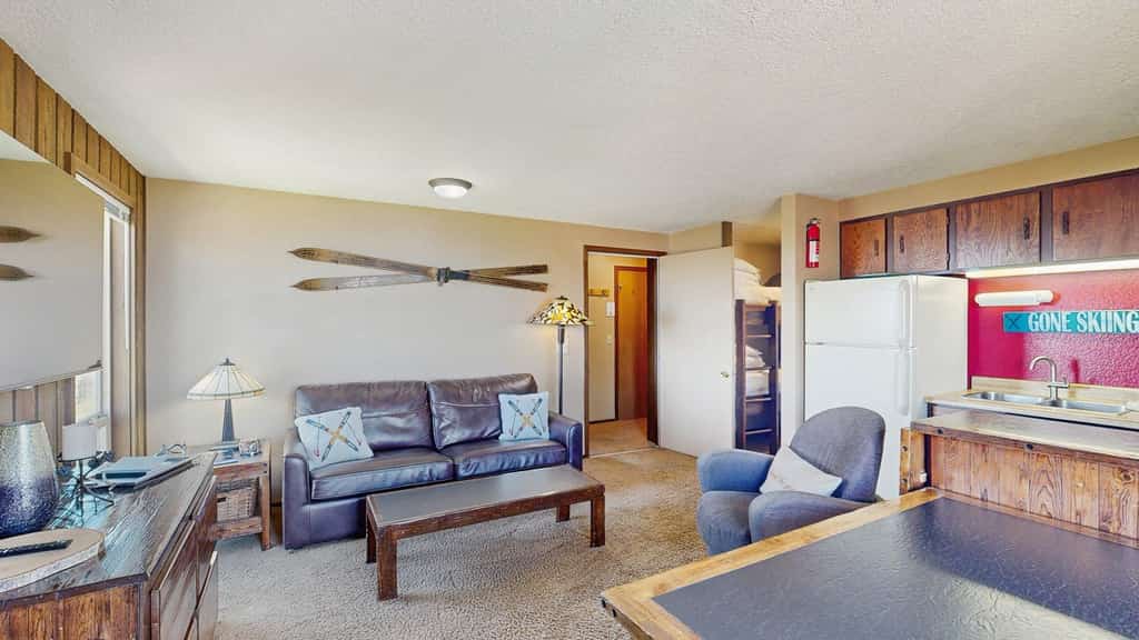 Make the most of your time on the mountain from this second-floor ski-in/ski-out condo in Bogus Basin. A cozy home base with easy access to the slopes and trails, it features a functional kitchen, flexible sleeping arrangements, and a private deck overlooking Boise. Whether you're visiting for ski season or summer adventures, you'll be just steps from everything Bogus Basin has to offer.
