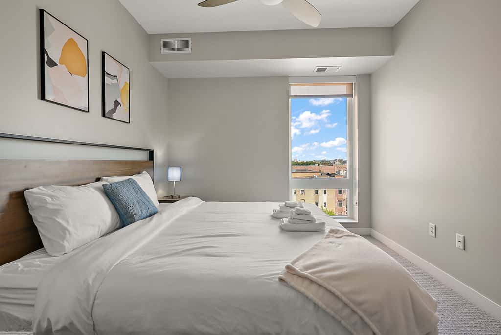 CozySuites Marquee 1BR w/ pool & gym | Queen bed