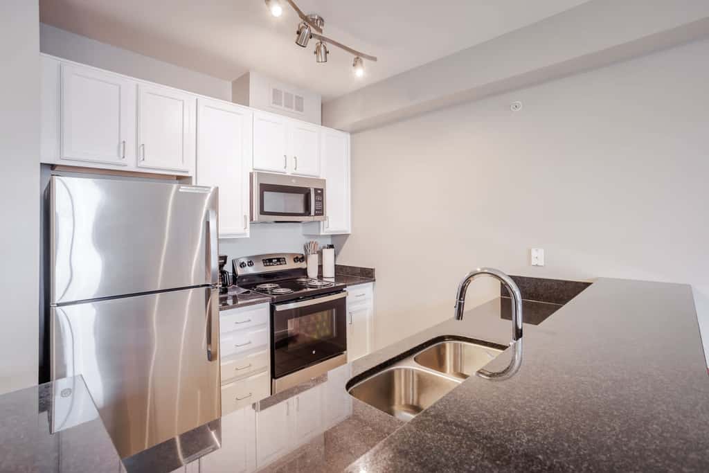 Two Stylish 4BR/4BA CozySuites at the Banks