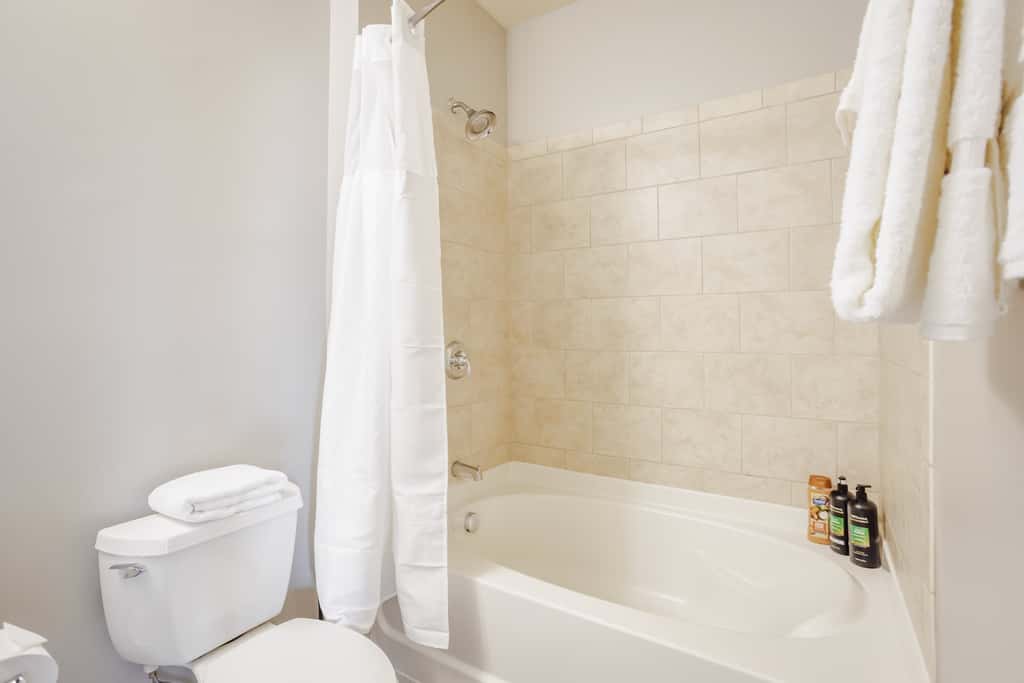 Two Stylish 4BR/4BA CozySuites at the Banks
