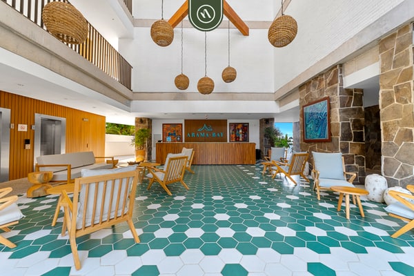 1BR Bucerías condo with pool, gym, balcony, WiFi, and beach views.