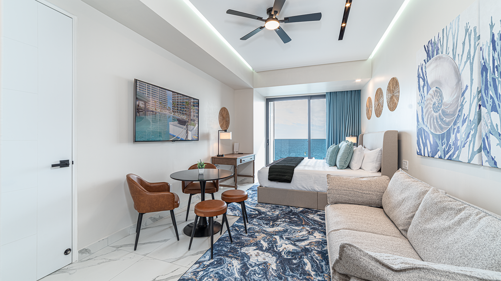 Encantame Soleil studio with king bed, 1 bath, for up to 2 adults.