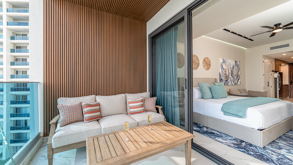 Encantame Soleil studio with king bed, 1 bath, for up to 2 adults.
