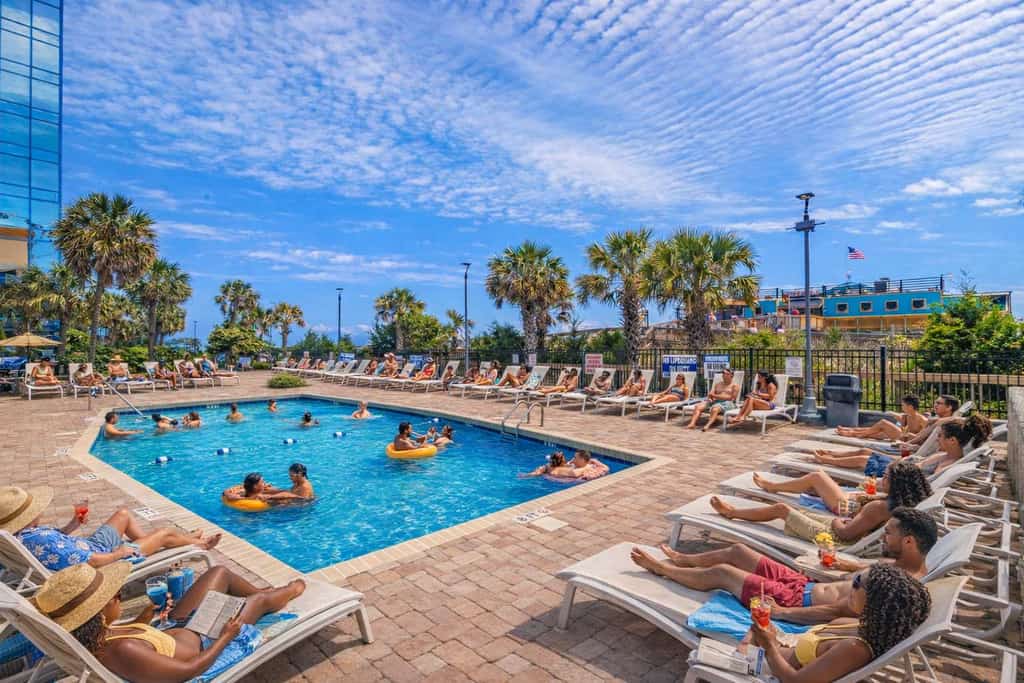 Escape to Myrtle Blue Retreat, your ultimate oceanfront getaway at the iconic Yachtsman Resort, South Tower, where breathtaking Atlantic views and the soothing sound of the waves create the perfect setting for your Myrtle Beach vacation. Perched on the 9th floor, Myrtle Blue Retreat is a beautifully updated one-bedroom condo just steps from the lively Myrtle Beach Boardwalk and the historic Pier 14. With modern coastal finishes, an open layout, and 