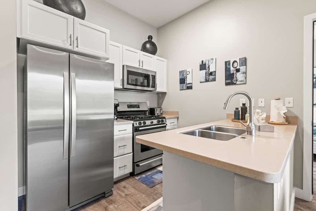 Escape to the perfect mountain getaway in this beautifully furnished 1-bedroom, 2-bathroom condo in Heber City. Thoughtfully designed for comfort and convenience, this rare floor plan offers the privacy of two full bathrooms, making it ideal for couples, small families, business travelers, or friends exploring Utah's Wasatch Mountains.

Relax in the bright, open living area after a day of adventure, prepare meals in the fully equipped kitchen, and unwind in the spacious bedroom featuring plush bedding and ample storage. Whether you're here for a weekend escape or an extended stay, you'll have everything you need to feel right at home.

Located just minutes from Jordanelle Reservoir, Deer Valley East Village, and Park City, you'll enjoy easy access to world-class skiing, hiking, mountain biking, boating, golf, and year-round outdoor recreation. Historic Main Street Park City, local restaurants, shopping, and the charm of downtown Heber are all just a short drive away.

Highlights
Rare 1 bedroom, 2 full bathroom layout
Cozy fireplace for relaxing evenings
Fully equipped kitchen
Comfortable open-concept living area
On-Site Pool & Fitness Center
High-speed Wi-Fi
Minutes from Deer Valley, Park City and Jordanelle Reservoir
Perfect for vacations, remote work, or extended stays

Whether you're chasing powder in the winter, lake days in the summer, or colorful mountain scenery in the fall, this inviting condo is the perfect home base for making unforgettable memories in every season.