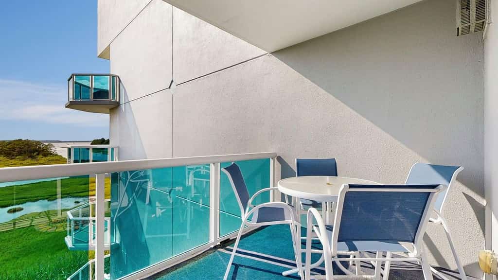 Sunset Pointe Retreat with Pool, Balcony & Prime Midtown Location