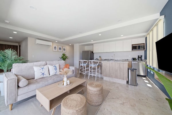 Enjoy this two-bedroom condo, thoughtfully designed with amazing ocean views
• One king-size bed and two single size beds
• Pool with parcial ocean views and sun loungers
• Private balcony with outdoor furniture
• Business center
• Fitness center
• Fifteen minutes driving to Cabo San Lucas downtown
• Convenience stores nearby
• Fully equipped kitchen, smart TV, and AC
• 24/7 security and controlled access