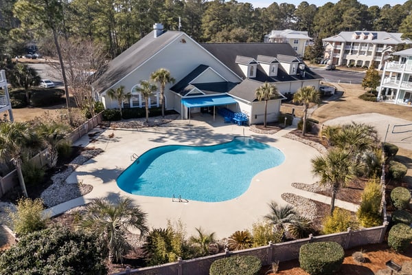 Coastal Golf Course Condo – Shared outdoor pool and fitness center