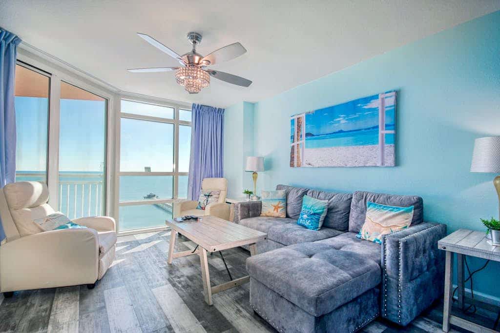 Ocean View condo with a balcony, heated pool, hot tub, W/D, gym, & beach access
