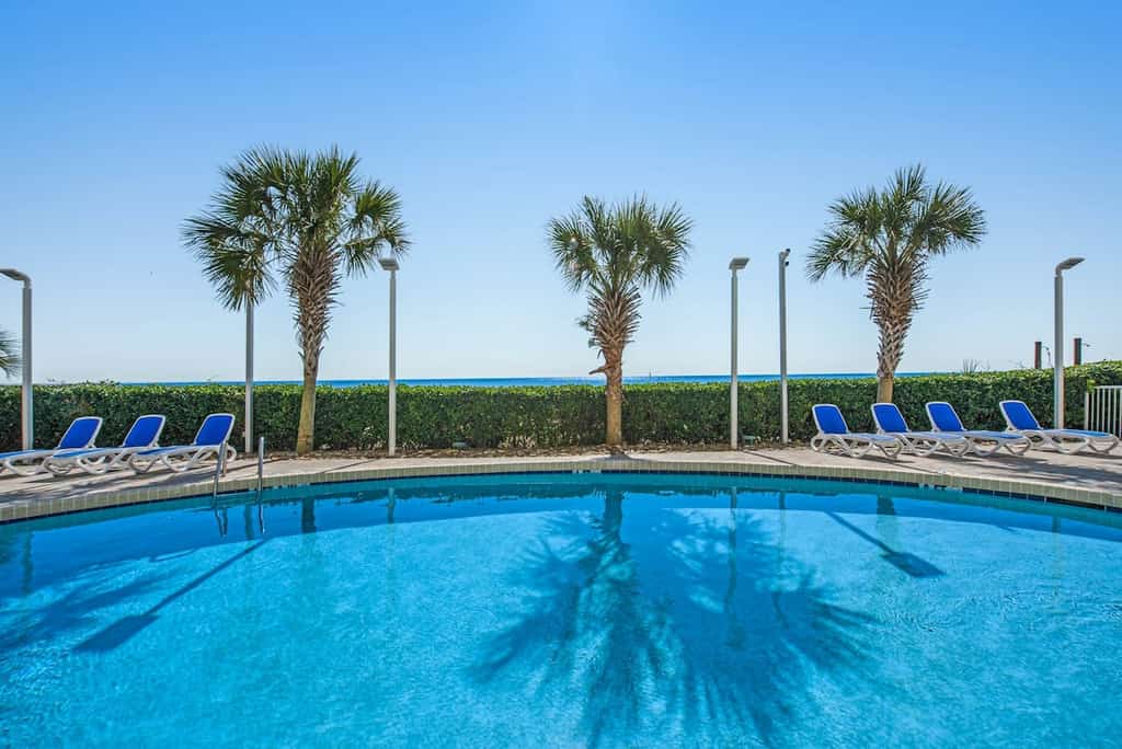 Beautiful beachfront condo with pool, hot tub, beach access, & washer/dryer