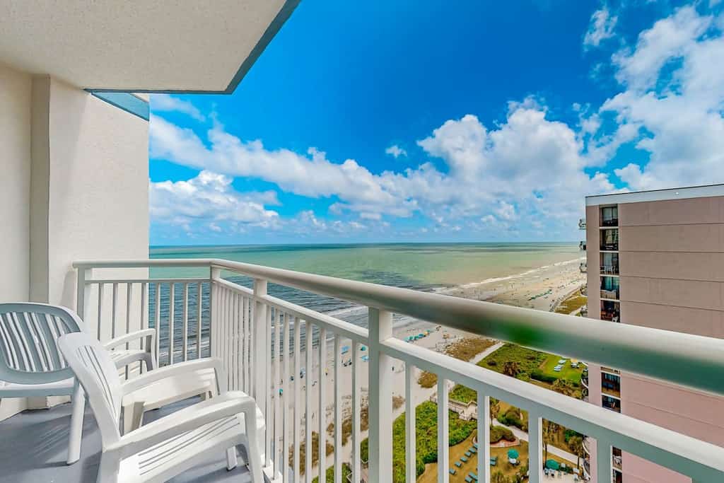 Beautiful beachfront condo with pool, hot tub, beach access, & washer/dryer